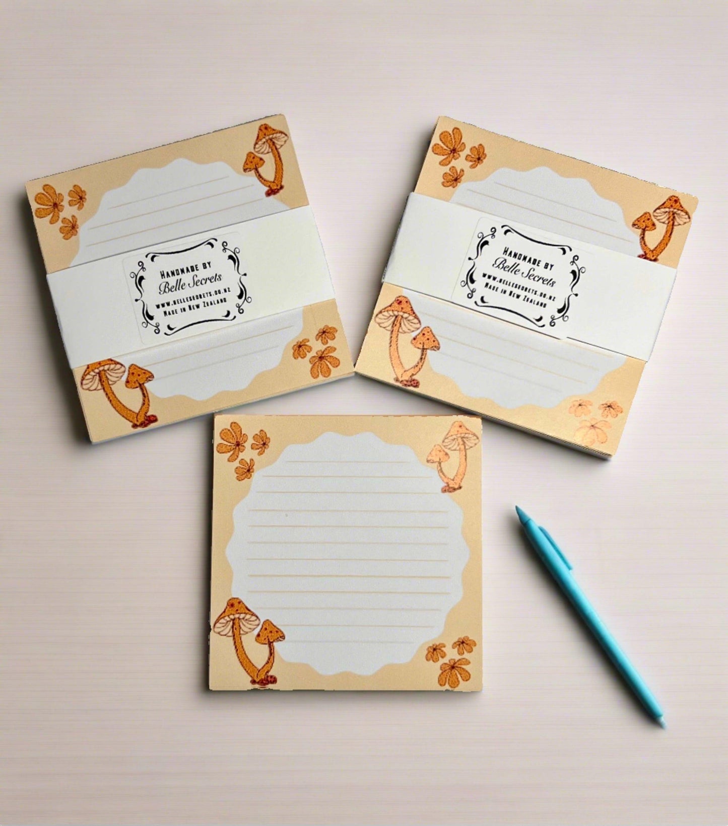 handmade notepad with mushroom desing and sunflower